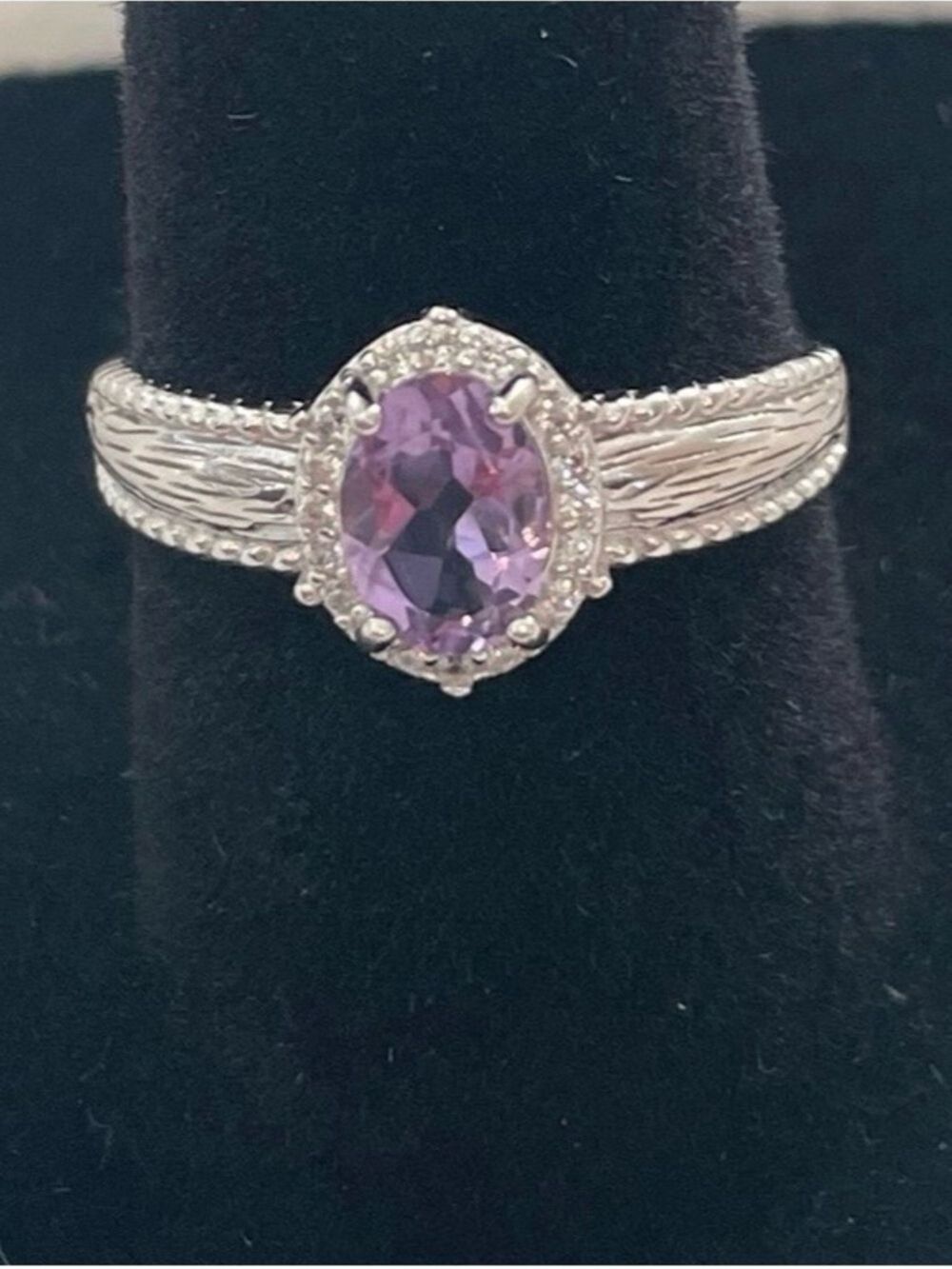 Women’s solid silver with center purple stone and Moissanite halo ring